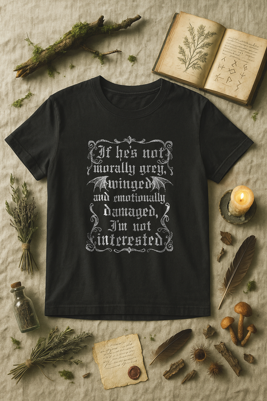 "If He’s Not Morally Grey, Winged and Emotionally Damaged, I’m Not Interested 01" – Unisex Garment-Dyed Heavyweight T-Shirt