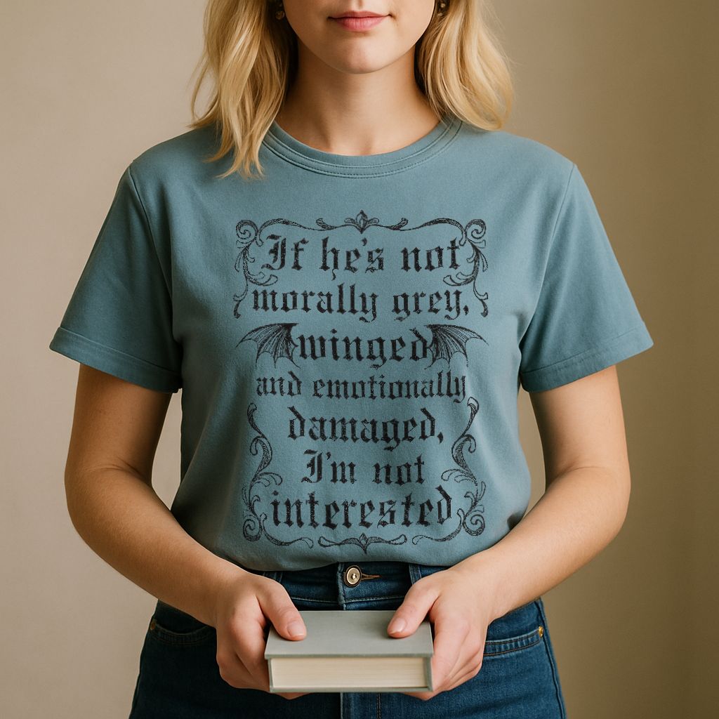 "If He’s Not Morally Grey, Winged and Emotionally Damaged, I’m Not Interested 01" – Unisex Garment-Dyed Heavyweight T-Shirt